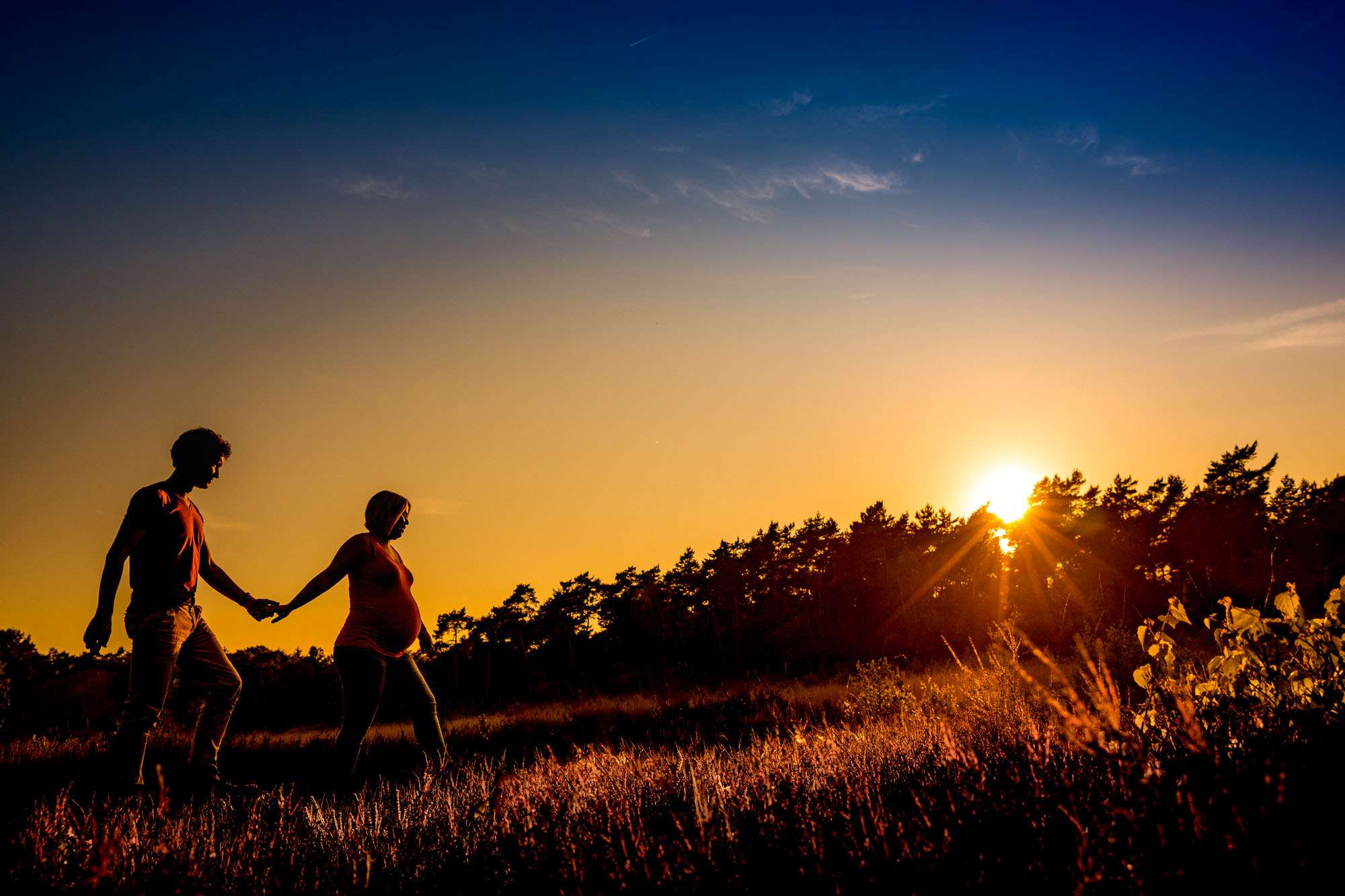 Zonsondergang Bolle buik fotoshoot buiten